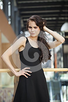 Make up beauty. Close up portrait young brunette woman in black dress