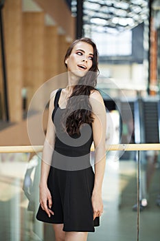 Make up beauty. Close up portrait young brunette woman in black dress