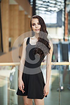 Make up beauty. Close up portrait young brunette woman in black dress