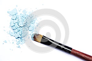 Make-up brush with blue eyeshadows