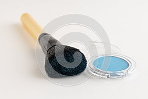Make-up brush with blue eyeshadows