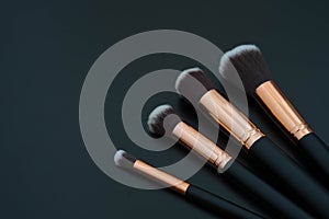 make up brushes on black