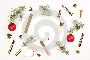 Make up cosmetic with Christmas decoration on white background flat lay