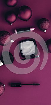 Make-up and cosmetics product set for beauty brand Christmas sale promotion, luxury magenta flatlay background as holiday design