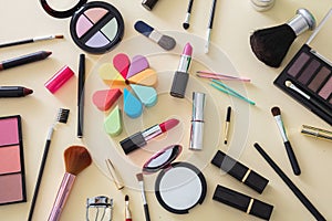 Make up cosmetics products against yellow color background