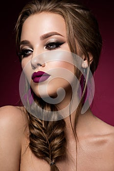 Make up. Glamour portrait of beautiful woman model with fresh makeup and romantic hairstyle.