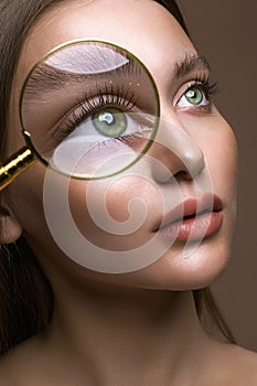 Make-up in lens. Beautiful woman face