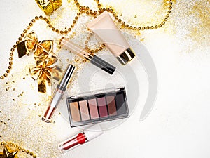 Make up for new year holiday party, makeup set. Festive new-year flat lay.