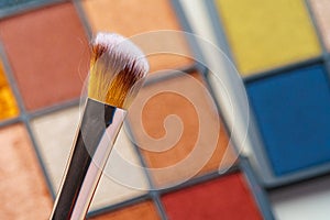 Make-up palette and brushes. Professional eyeshadow palette.