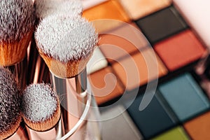 Make-up palette and brushes. Professional eyeshadow palette.