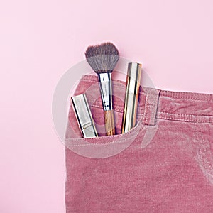 Make-up in pink pants pocket