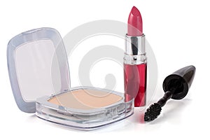 Make-up powder, lipstick and mascara isolated on white background