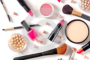 Make-up products, shot from the top on a white background