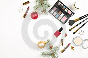 Make up set cosmetic with christmas decoration on white background flat lay