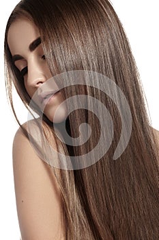 Make-up, wellness, spa. Beautiful model with long straight shiny hair