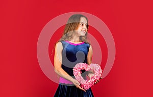 Make way for love this valentine. Happy girl hold wicker heart. Little child with holiday decor. Love and affection