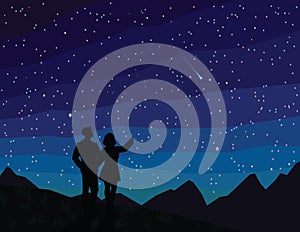 Make a wish. Silhouette of couple, watching falling star.
