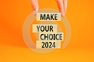 Make your choice 2024 symbol. Concept words Make your choice 2024 on beautiful wooden block. Beautiful orange table orange