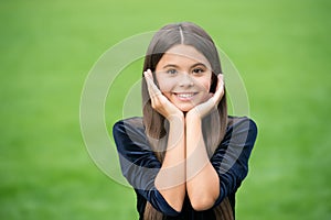 Make your skin shine. Happy girl smile green grass. Skin health. Pediatric dermatology. Natural skincare. Beauty salon