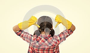 Make your world spotless. Housekeeping duties. Cleaning supplies. Girl rubber gloves for cleaning white background