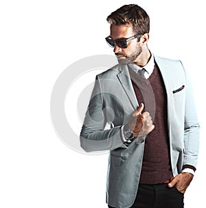 He makes any outfit look good. Studio shot of a handsome young man posing against a white background.