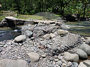 makeshift bridge on the river