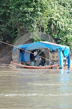 Makeshift gold barge on river