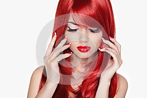 Makeup. Beautiful girl with red long hair. Fashion model isolate