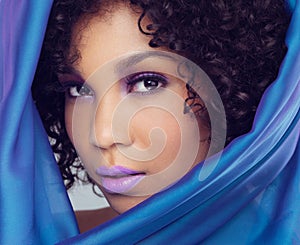 Makeup, beauty and portrait of female person, material or scarf around face for cosmetics. Lipstick, studio and drape