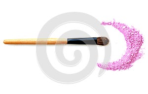 Makeup brush with pink powder isolated on white.