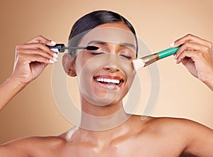 Makeup brush, portrait or happy woman with beauty mascara, facial products or self care on studio background. Face smile photo