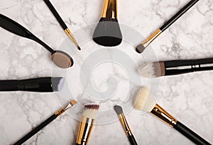 Makeup brushes on background.