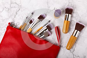 Makeup brushes on background.