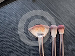 Makeup brushes on a black background. Make-up brushes