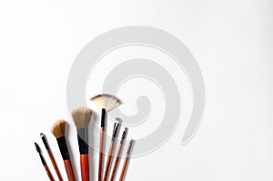 Makeup brushes isolated over white background