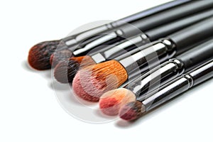 Makeup brushes isolated on white background. Professional make-up brushes. Cosmetologist tools for makeup. cosmetic brushes with photo