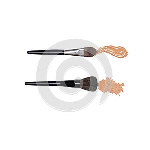 Makeup brushes with make-up foundation and powder isolated on white background
