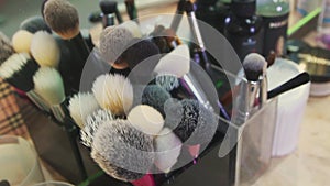 Makeup brushes in a modern beauty salon