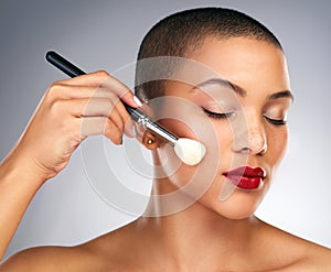 Makeup, brushes and woman in studio with red lips for lipstick and mascara routine. Cosmetics, confident and face of