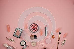 Makeup cosmetic product flay lay on pink background. woman and girl beauty concept .