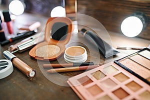 Makeup cosmetic set on the table closeup, nobody