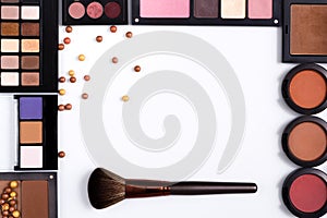 Makeup cosmetics tools and essentials frame background, copy space