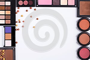 Makeup cosmetics tools and essentials frame background, copy space