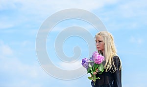 Makeup and fashion style. Fashion trend spring. Girl tender fashion model hold hydrangea flowers bouquet. Fashion and