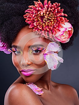 Makeup, flowers and art with portrait of black woman for beauty, creative and spring. Natural, cosmetics and floral with