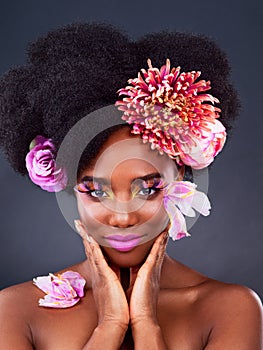 Makeup, flowers and art with portrait of black woman in studio for beauty, creative or spring. Natural, cosmetics and