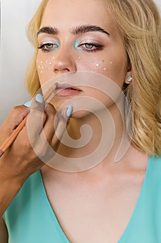 Makeup model in beauty saloon