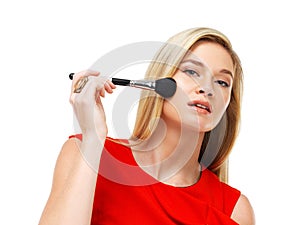 Makeup, portrait and woman in studio with brush application, tools and facial cosmetics. Fashion, beauty product and