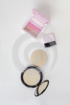 Makeup powder and pink blusher