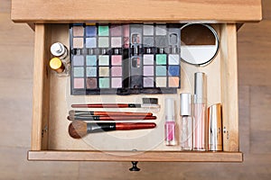 Makeup set in open drawer